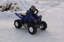 Three Year Old Does Donuts On ATV