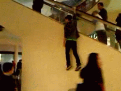Kid Falls Off Escalator